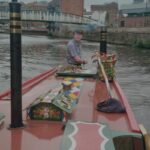 A skipper navigating the Leeds to Liverpool Canal